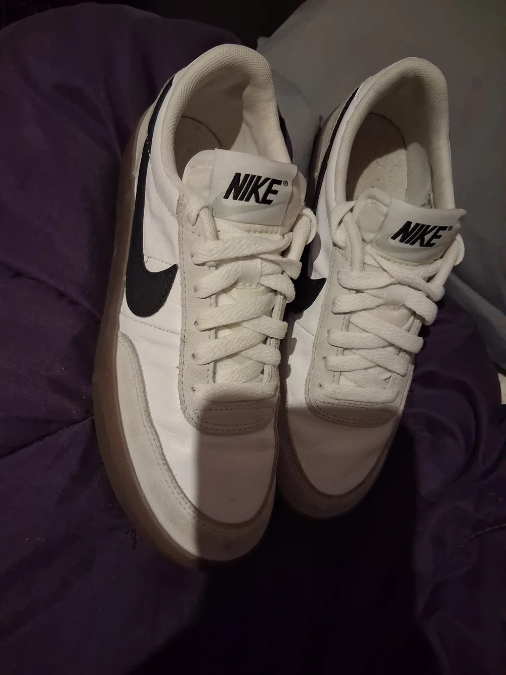 Nike White Sneakers with Black Swoosh